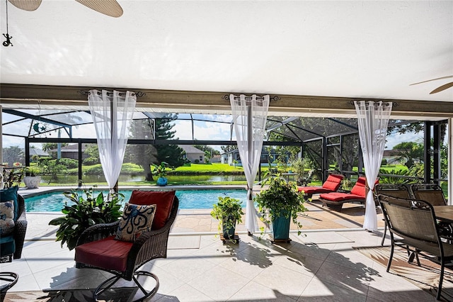 view of pool featuring ceiling fan