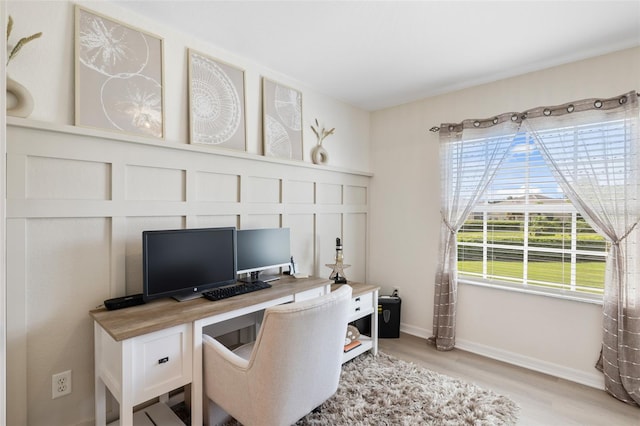 office area featuring light hardwood / wood-style floors