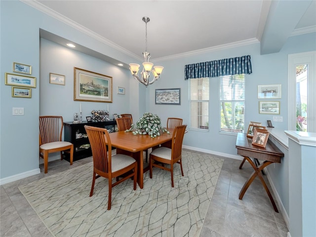 dining room with an inviting chandelier and ornamental molding