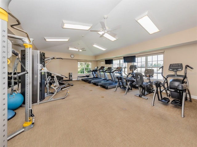 gym with ceiling fan, light carpet, and lofted ceiling