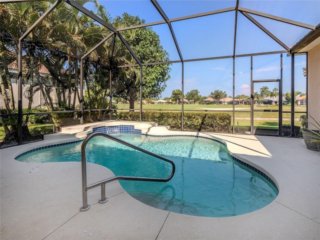 view of swimming pool with a lanai and a patio area