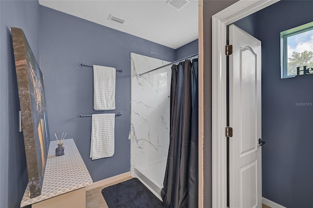 bathroom with curtained shower