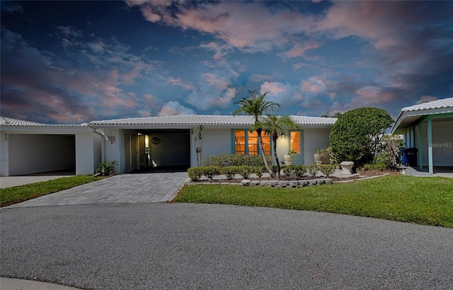 view of front of home featuring a carport