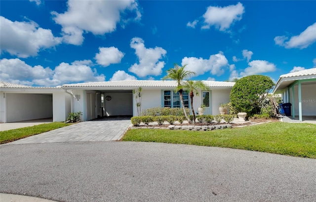 view of front of home featuring a carport