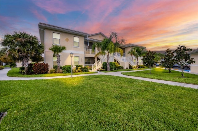 view of front of home with a yard