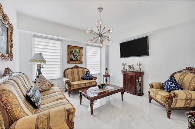 living room with marble finish floor and an inviting chandelier