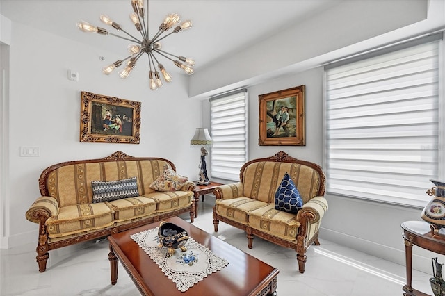 sitting room with an inviting chandelier and tile patterned floors