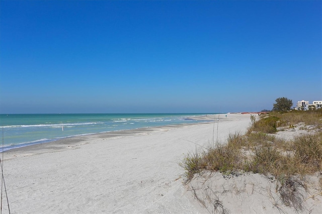 property view of water featuring a view of the beach