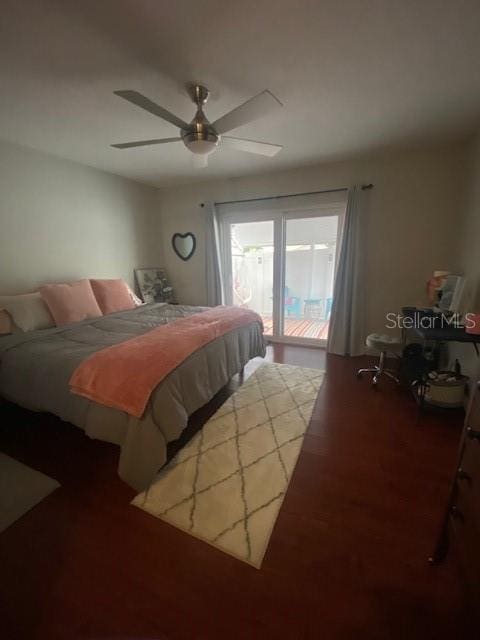 bedroom featuring ceiling fan and access to exterior