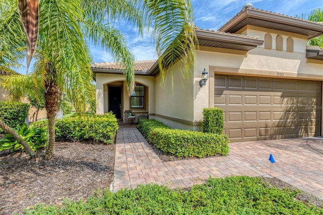 view of front of property featuring a garage