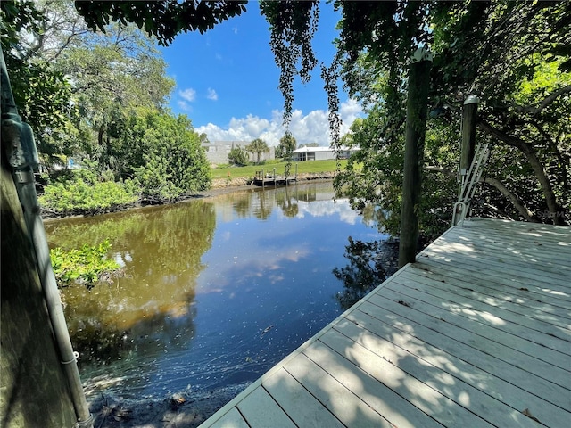 view of dock with a water view