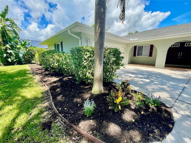 view of home's exterior featuring a yard