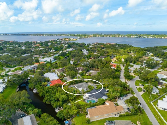 drone / aerial view with a water view