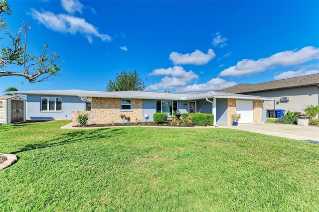 ranch-style home featuring a front lawn and a garage