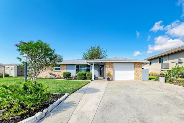 ranch-style home featuring a garage, a storage shed, and a front lawn