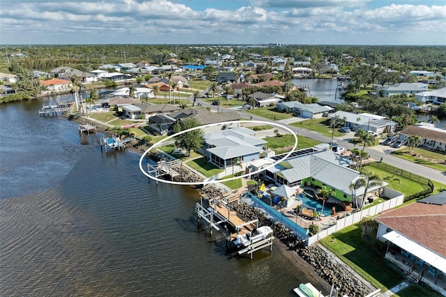 bird's eye view with a water view