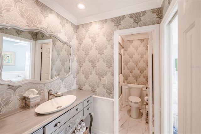 bathroom with toilet, crown molding, and vanity