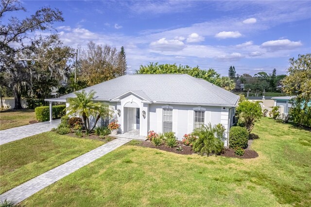 ranch-style house with a front yard