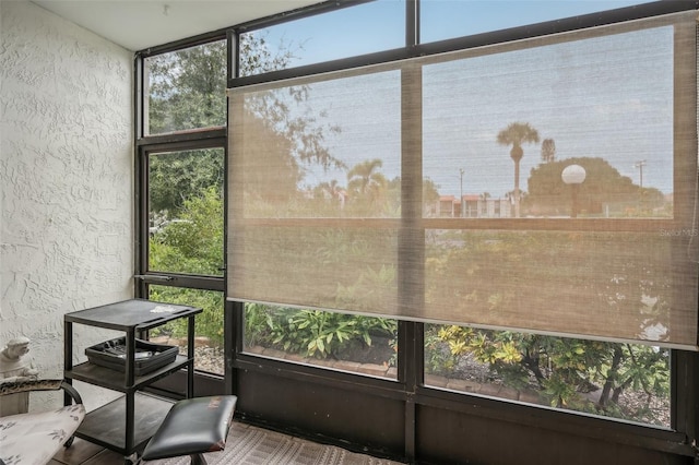 sunroom featuring a healthy amount of sunlight