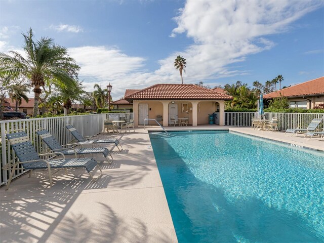 view of pool featuring a patio