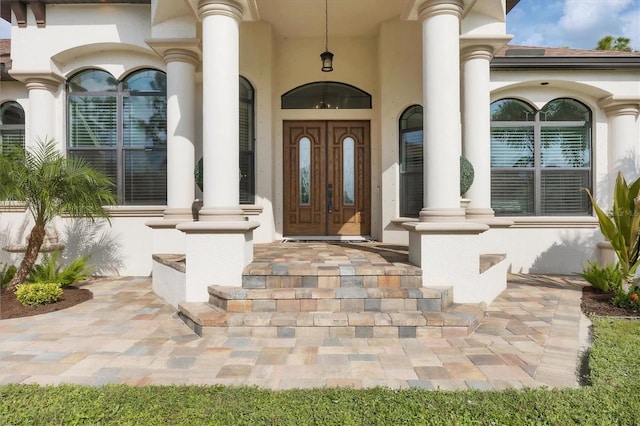 2197 Nita Ter, North Port, FL 34286 - view of exterior entry featuring stucco siding