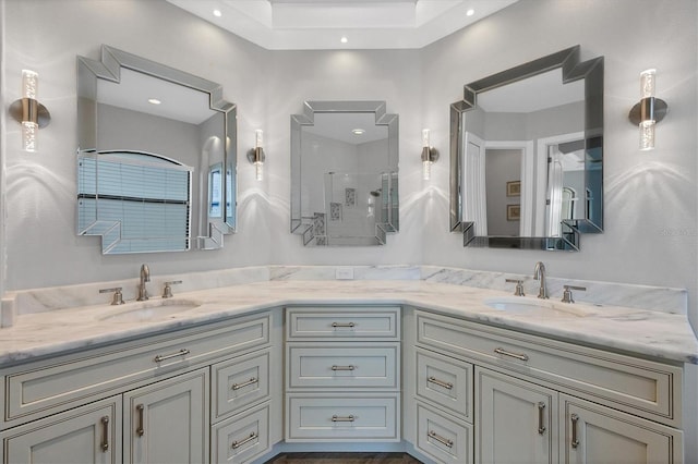 2197 Nita Ter, North Port, FL 34286 - full bathroom with a sink, a stall shower, and double vanity