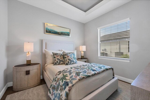 bedroom featuring hardwood / wood-style flooring