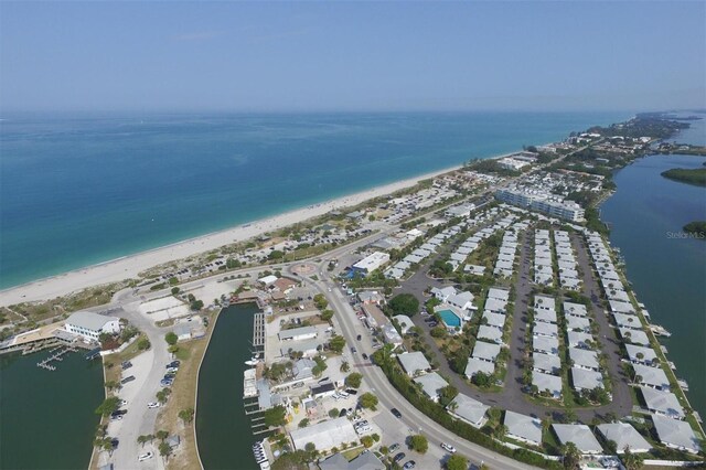 bird's eye view featuring a beach view and a water view