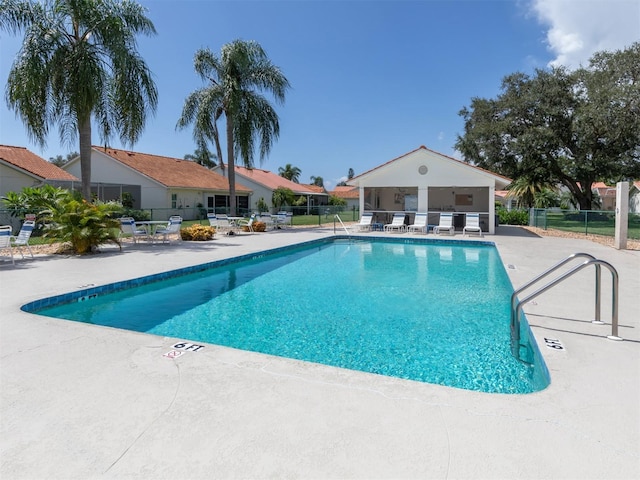 view of pool featuring a patio