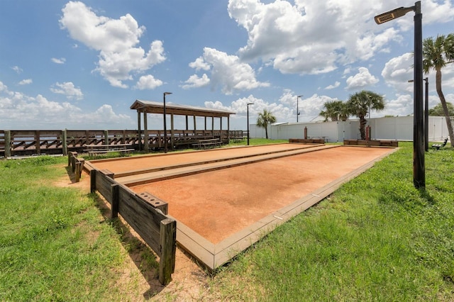 view of community featuring a lawn