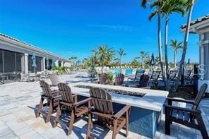 view of patio / terrace with a fire pit