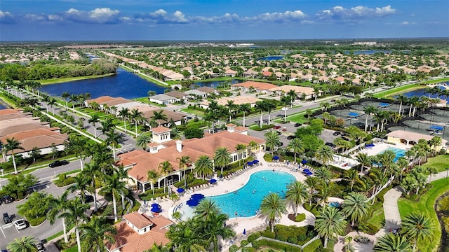 birds eye view of property featuring a water view