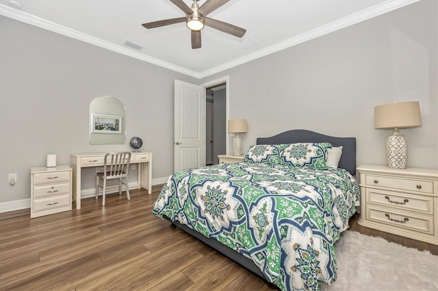 bedroom featuring ceiling fan, crown molding, and hardwood / wood-style flooring