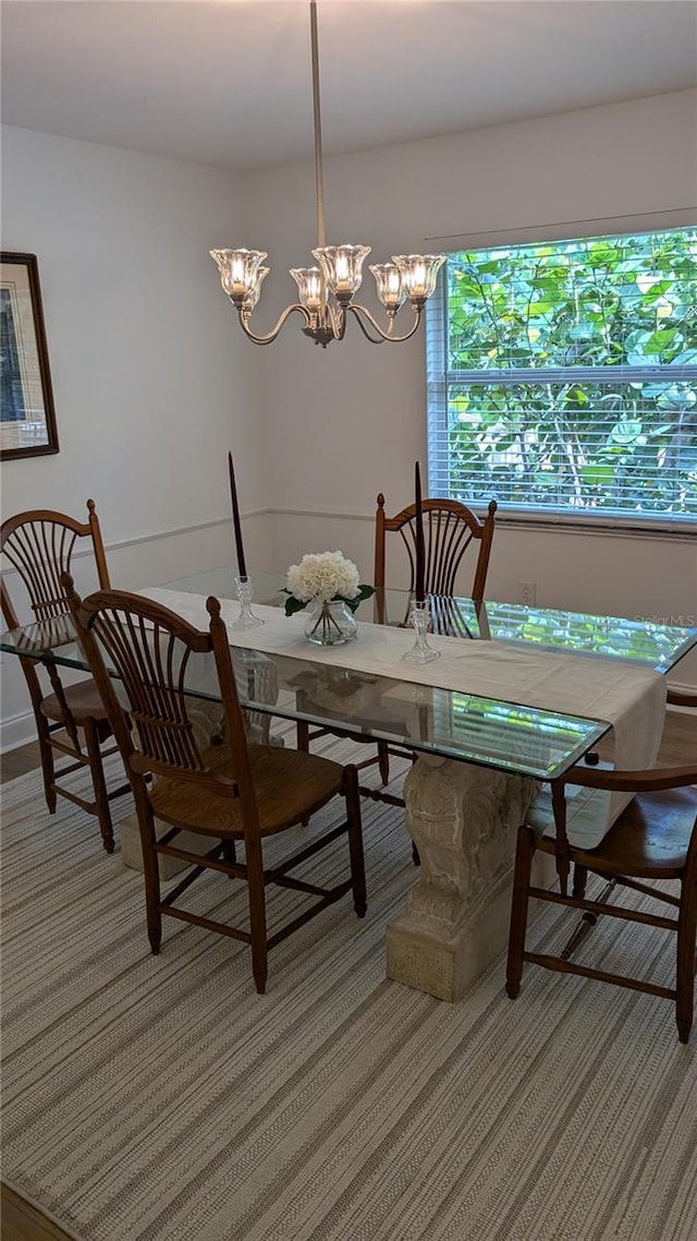 dining room featuring a notable chandelier