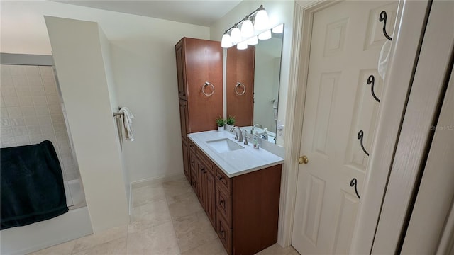 bathroom with tile patterned flooring, shower / bath combination, and vanity