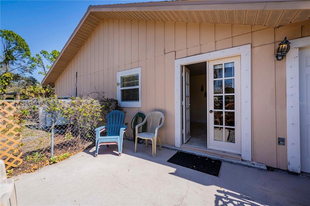 doorway to property featuring a patio area