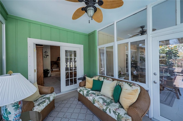 sunroom / solarium with ceiling fan