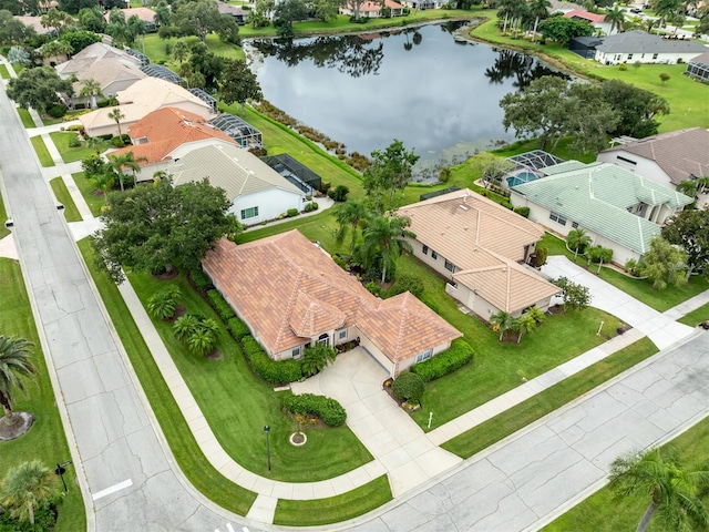 bird's eye view with a water view