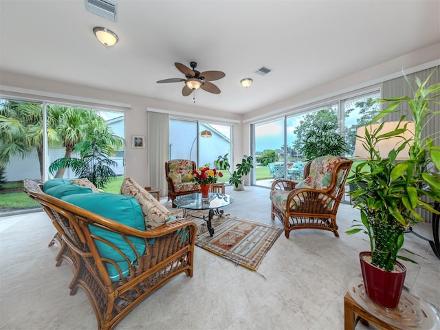 living room featuring ceiling fan