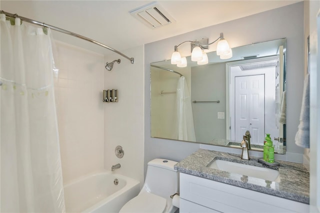 full bathroom featuring vanity, shower / tub combo, and toilet