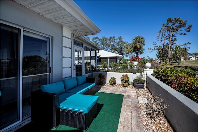 view of patio with a sunroom and an outdoor hangout area