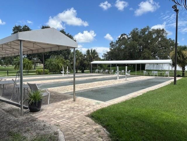 view of home's community featuring a lawn