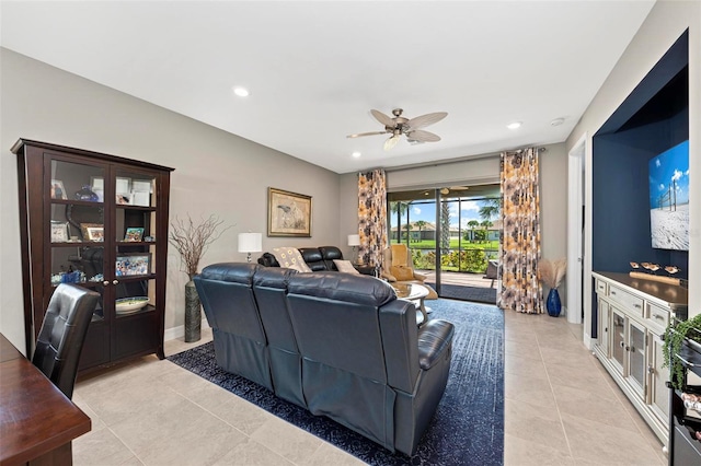 tiled living room featuring ceiling fan