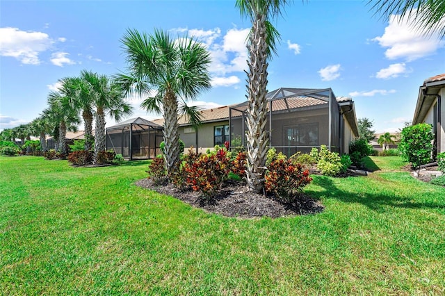 view of yard featuring a lanai