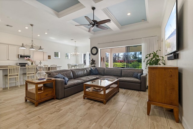 living room with visible vents, coffered ceiling, beamed ceiling, crown molding, and ceiling fan with notable chandelier