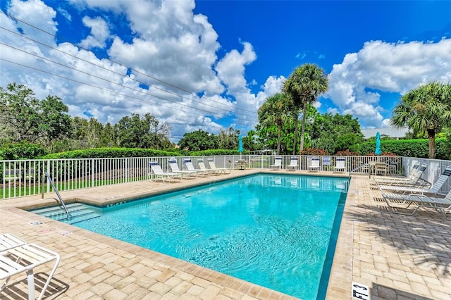 view of pool with a patio area