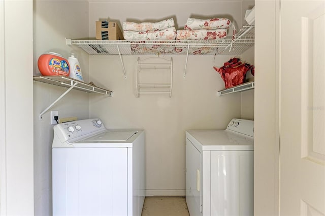 laundry area with laundry area and independent washer and dryer