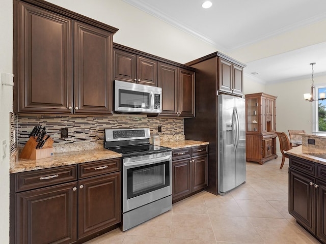 kitchen with appliances with stainless steel finishes, dark brown cabinets, and decorative backsplash