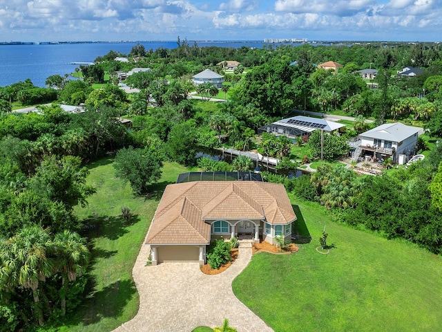 birds eye view of property featuring a water view