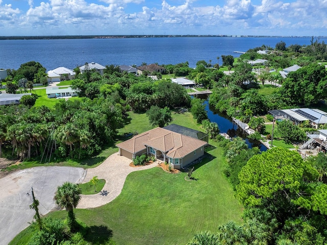 drone / aerial view with a water view